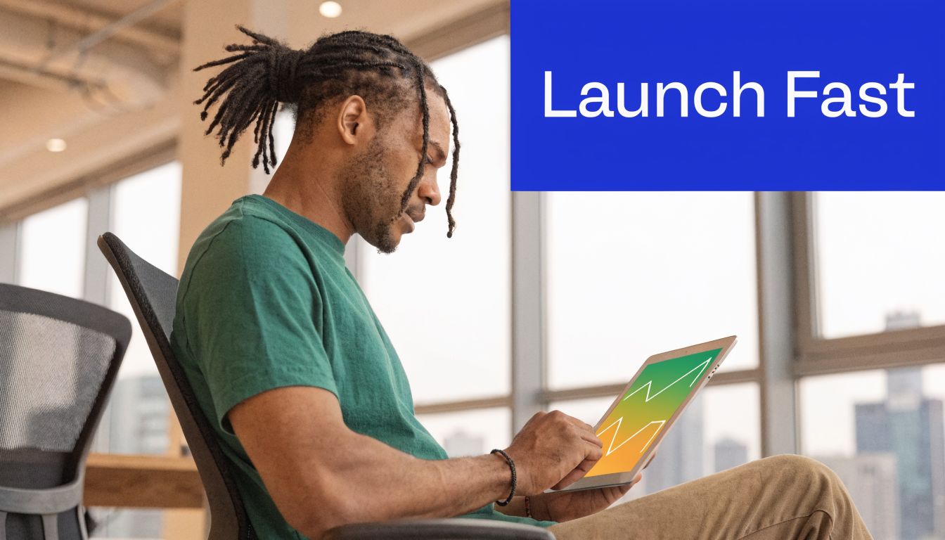 A man with dreadlocks working on a tablet, with the blue Launch Fast text overlaying the image.